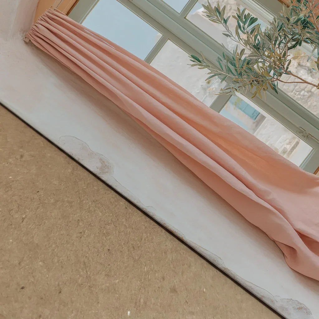 Close-up angle showing the pastel artwork’s texture, peach curtain tones and print clarity, photographed on a cork-backed board to highlight real-life depth, colour accuracy and material quality.