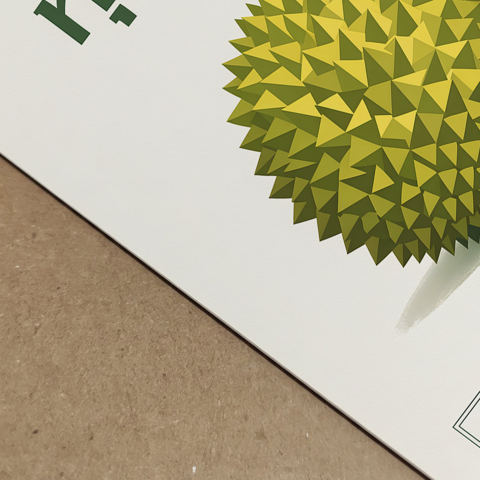 Close-up angled view of the durian artwork highlighting the detailed geometric spikes and layered green tones. The print’s cream background and Thai typography are partially visible, with depth created by shadow and perspective. This detailed crop emphasises texture, design precision and the contemporary botanical style of the poster.