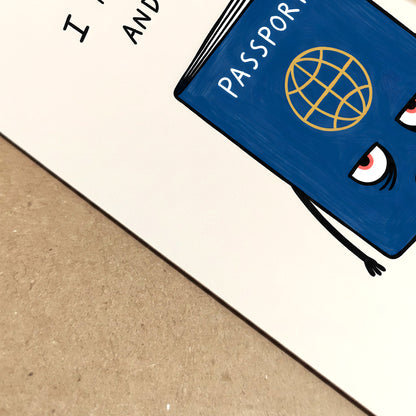Close-up detail of a funny passport print showing the blue passport character, sleepy eyes and hand-drawn travel quote on textured paper. The angled view highlights the simple linework, cream background and quirky travel poster style, ideal for passport wall art and travel lover gifts.