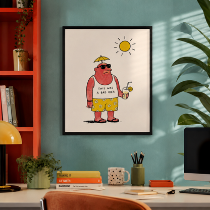 Funny travel poster framed in black on a colourful office wall with teal paint, orange shelving, plants, books and desk accessories. The artwork shows a sunburnt man with sunglasses, yellow shorts and a drink under the sun, creating playful holiday wall art for an office, studio or travel gallery wall.