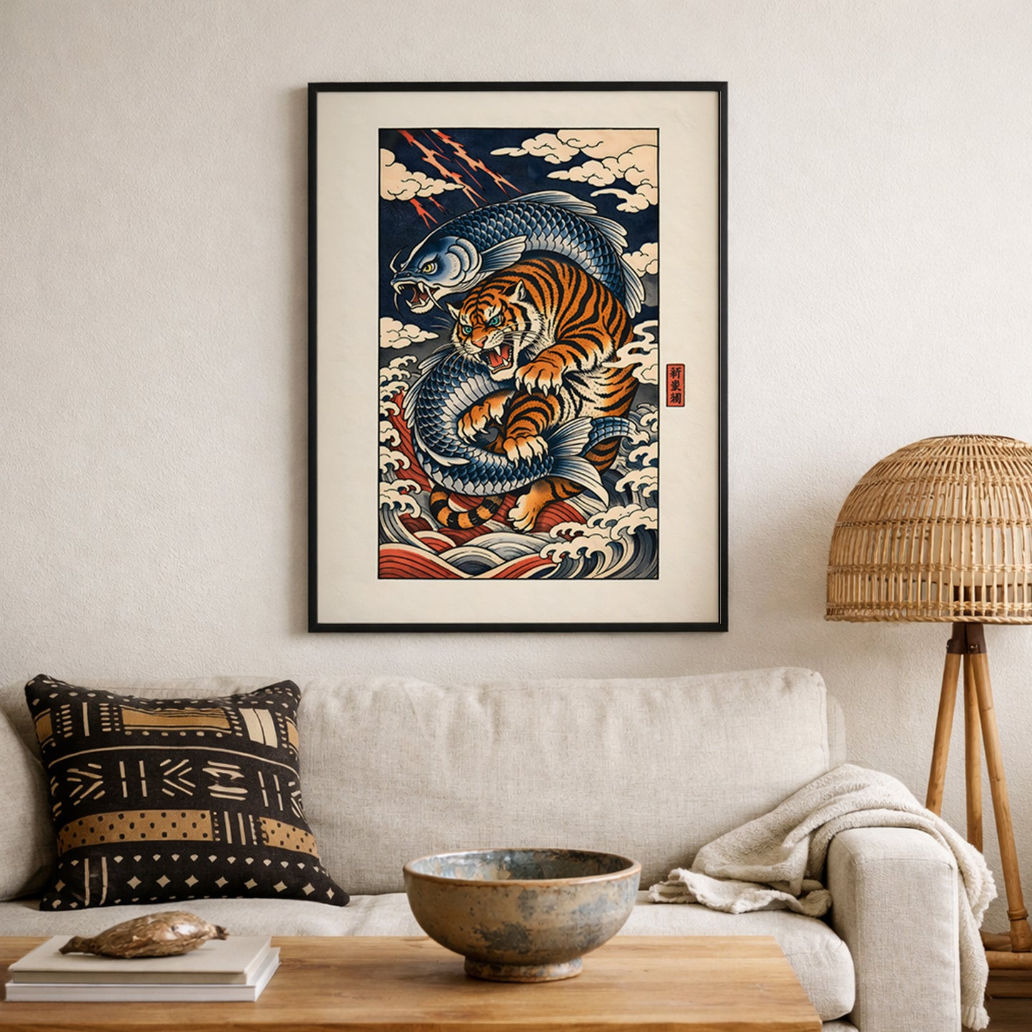 Japanese tiger and wave wall art hung in a neutral living room above a sofa with textured cushions and natural décor. The striking orange tiger intertwined with deep blue waves brings energy and movement to the space. Inspired by traditional Asian woodblock prints, this framed wildlife artwork adds cultural depth and visual impact.