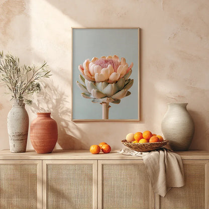 A pastel artichoke wall art print styled above a mantle with decorative vases and warm daylight. Natural textures and earthy neutrals enhance the artwork’s soft botanical palette and contemporary interior aesthetic.