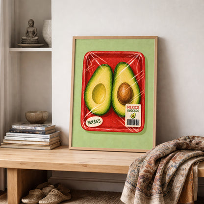 Mexican avocado wall art in a wooden frame on a shelf with stacked books, a woven textile and warm neutral decor, styled as a lived-in kitchen or dining space.