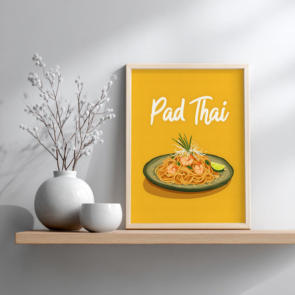 Pad Thai illustrated print in a small wooden frame displayed on a shelf