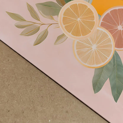 Close-up detail of the pastel citrus artwork showing the grapefruit, lemon, leaves and soft textures on the pink and beige split background, highlighting print clarity, colour depth and paper detail.
