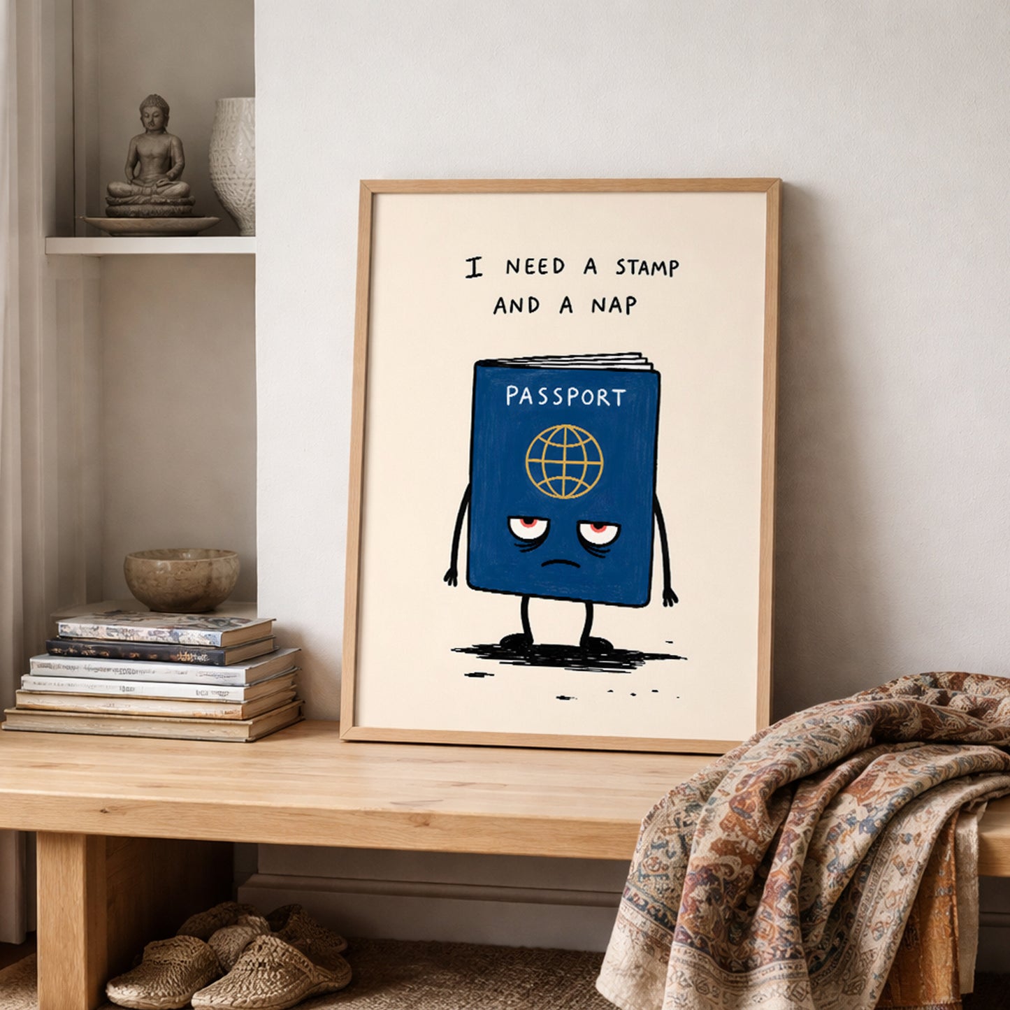 Funny travel print styled on a shelf beside soft home decor, showing a small blue passport character with tired red eyes under the words “I need a stamp and a nap”. The cream background and loose drawn style make it a relaxed passport poster for bedrooms, offices and travel themed rooms.