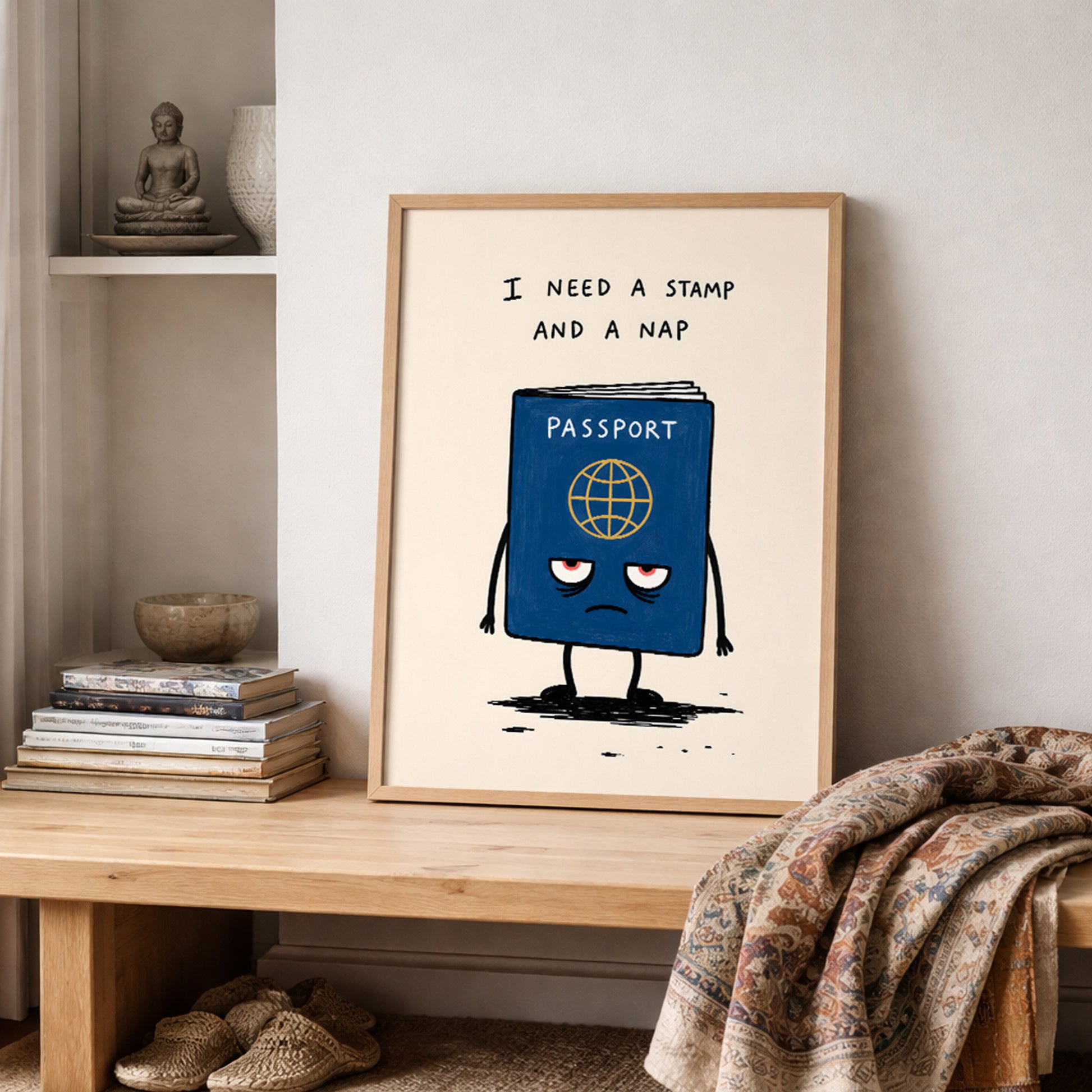 Funny travel print styled on a shelf beside soft home decor, showing a small blue passport character with tired red eyes under the words “I need a stamp and a nap”. The cream background and loose drawn style make it a relaxed passport poster for bedrooms, offices and travel themed rooms.