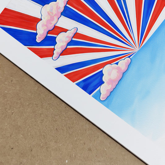 Close-up detail of the Thai Sky Sunburst poster print showing crisp red, white and blue rays and soft pink clouds against a clear blue sky. The image highlights paper texture and print quality of the Thailand travel art. Bold Southeast Asia wall decor with sharp graphic finish.