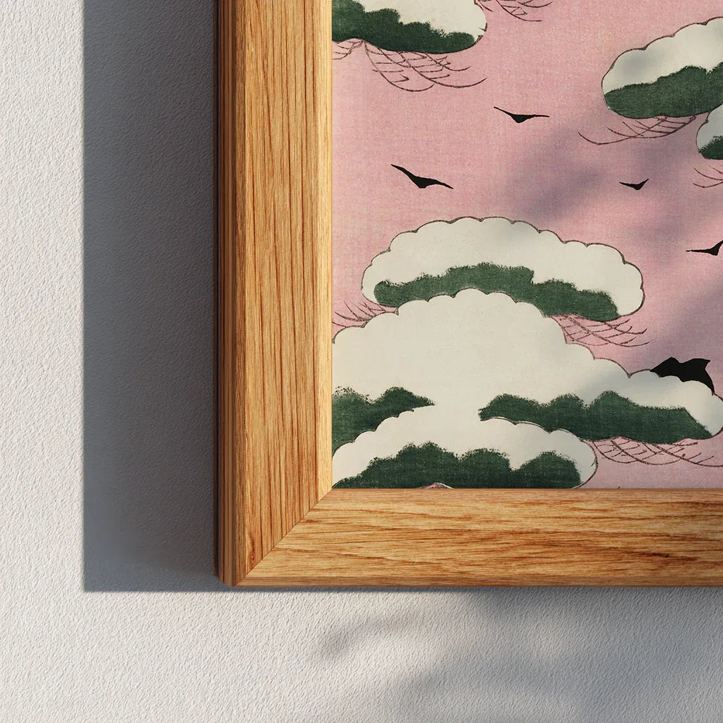 Close-up of a wooden frame corner showing the vintage Shin Bijutsukai pink sky print with cloud and bird detail.
